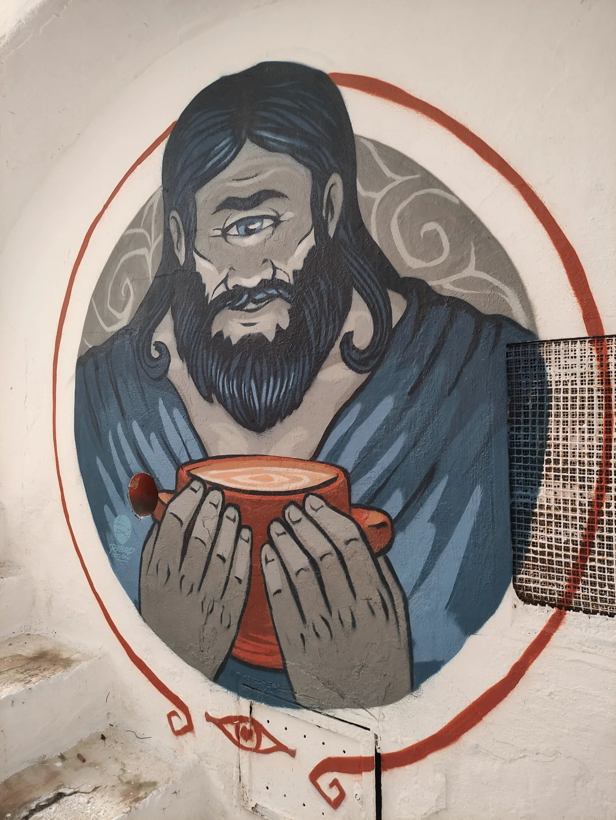 Il murale di Polifemo, ritratto mentre beve dalla coppa offerta da Ulisse